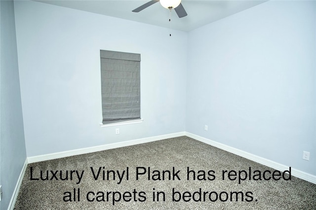 empty room with carpet flooring and ceiling fan