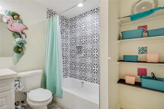 full bathroom featuring shower / bath combo, vanity, and toilet