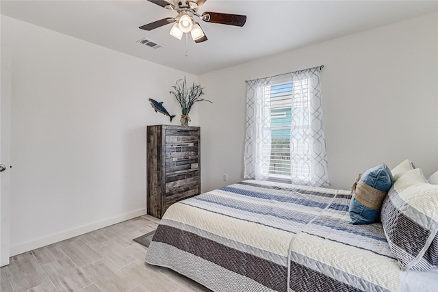 bedroom featuring ceiling fan and light hardwood / wood-style floors