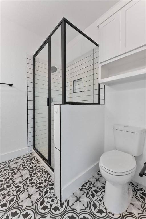 4209 Walnut Hills Dr, Corpus Christi, TX 78413 - full bath with baseboards, a stall shower, toilet, and tile patterned floors