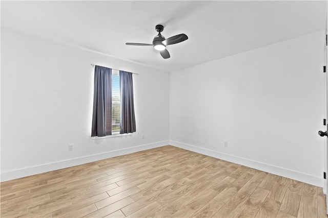 4209 Walnut Hills Dr, Corpus Christi, TX 78413 - empty room featuring light wood-style floors, ceiling fan, and baseboards