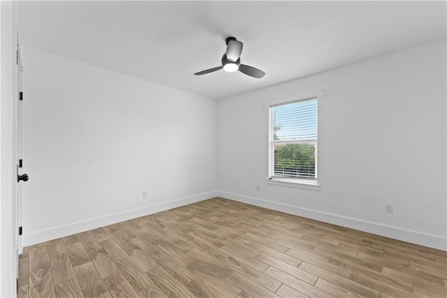 4209 Walnut Hills Dr, Corpus Christi, TX 78413 - empty room with light wood-style floors, a ceiling fan, and baseboards