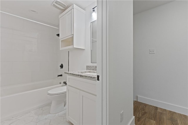 4209 Walnut Hills Dr, Corpus Christi, TX 78413 - full bathroom featuring vanity, toilet, and washtub / shower combination