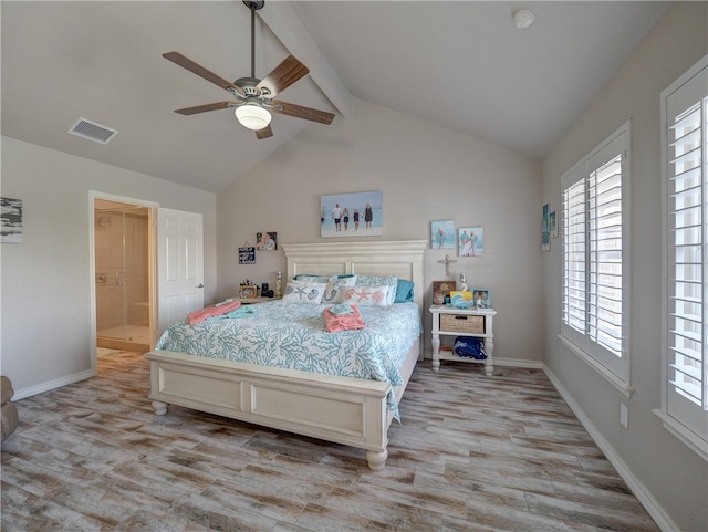 bedroom with ceiling fan, light hardwood / wood-style floors, and vaulted ceiling with beams