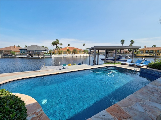 view of pool featuring a boat dock and a water view