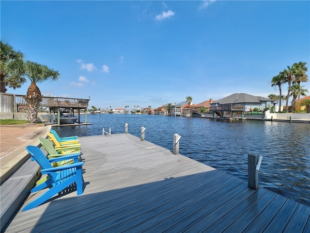 dock area with a water view