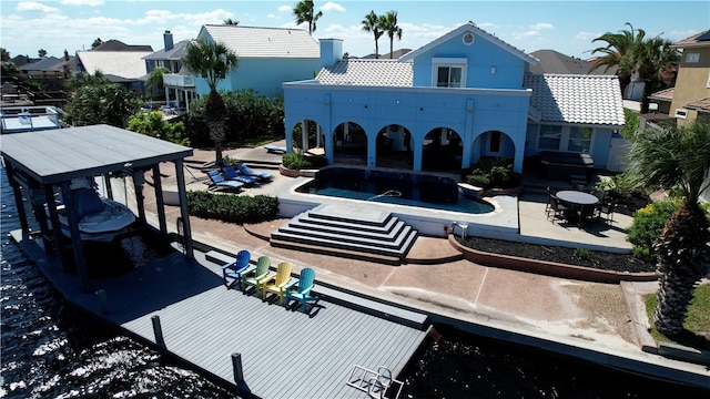 back of house featuring a patio