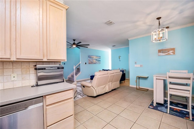 kitchen featuring light tile patterned floors, visible vents, stainless steel dishwasher, backsplash, and crown molding