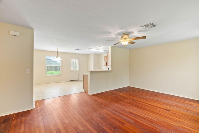 1606 W Nelson Ave, Aransas Pass, TX 78336 - empty room with ceiling fan and hardwood / wood-style floors