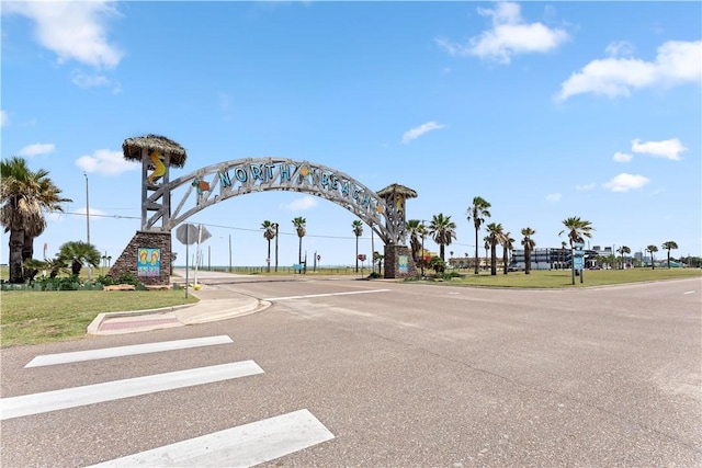 3938 Surfside Blvd Unit 3118, Corpus Christi, TX 78402 - view of asphalt street featuring traffic signs and curbs