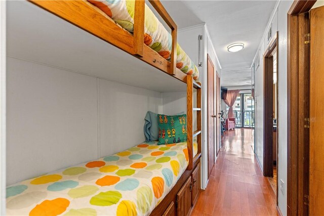 3938 Surfside Blvd Unit 3118, Corpus Christi, TX 78402 - bedroom featuring wood finished floors