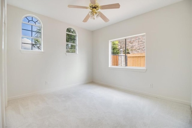 6302 Grandvilliers Dr, Corpus Christi, TX 78414 - carpeted spare room with baseboards and ceiling fan
