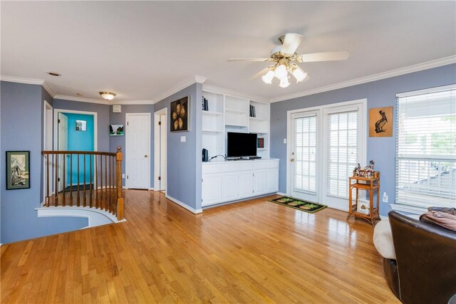 6910 Sir Galahad, Corpus Christi, TX 78413 - living area featuring light wood-type flooring, a ceiling fan, and crown molding