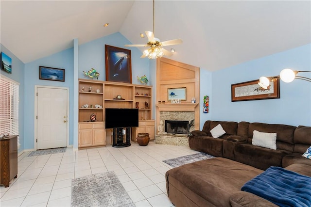 6910 Sir Galahad, Corpus Christi, TX 78413 - living room with ceiling fan, light tile patterned flooring, high vaulted ceiling, and a fireplace