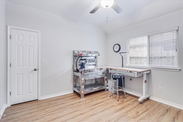 misc room with lofted ceiling, light wood-style floors, baseboards, and a ceiling fan