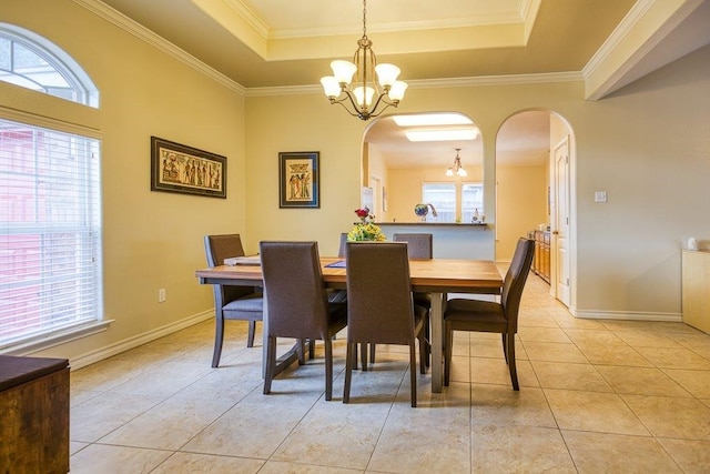 324 Nicklaus Dr, Portland, TX 78374 - dining area featuring crown molding, plenty of natural light, and a raised ceiling