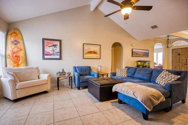 324 Nicklaus Dr, Portland, TX 78374 - living room with beamed ceiling, ceiling fan, tile patterned floors, and high vaulted ceiling