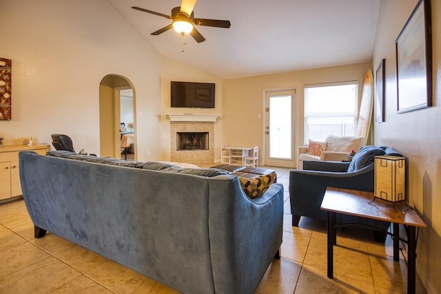 324 Nicklaus Dr, Portland, TX 78374 - tiled living room featuring ceiling fan and high vaulted ceiling