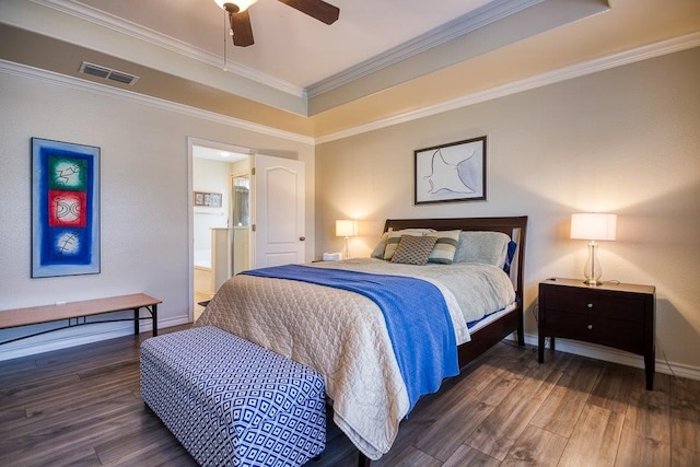 324 Nicklaus Dr, Portland, TX 78374 - bedroom featuring dark wood-type flooring, connected bathroom, crown molding, a tray ceiling, and ceiling fan