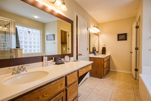 324 Nicklaus Dr, Portland, TX 78374 - bathroom with tile patterned flooring, vanity, and independent shower and bath