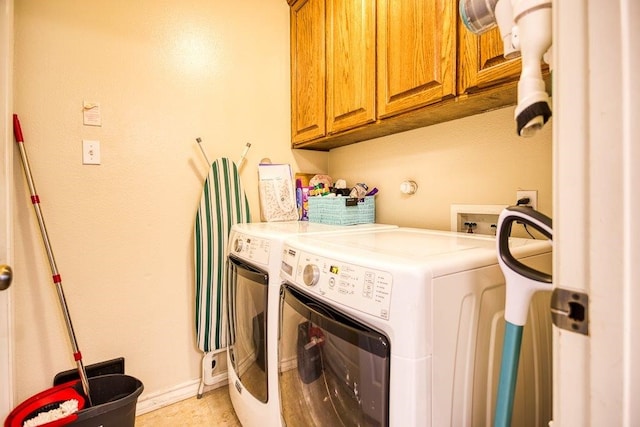 324 Nicklaus Dr, Portland, TX 78374 - laundry area with cabinets and washer and clothes dryer