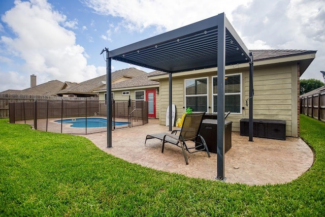 324 Nicklaus Dr, Portland, TX 78374 - rear view of property featuring a yard, a fenced in pool, and a patio area