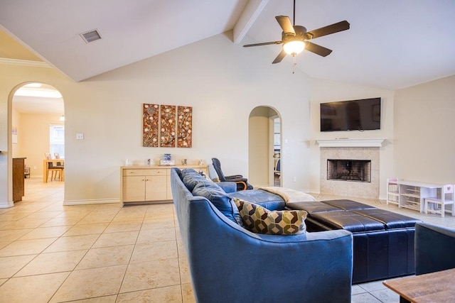 324 Nicklaus Dr, Portland, TX 78374 - living room with light tile patterned floors, a premium fireplace, ceiling fan, high vaulted ceiling, and beamed ceiling