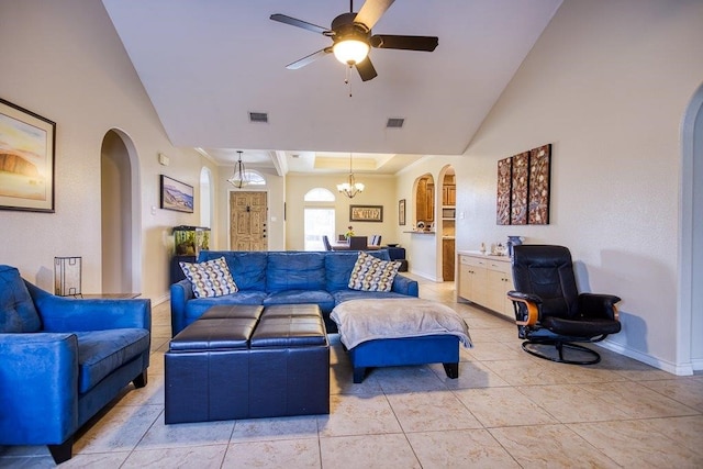 324 Nicklaus Dr, Portland, TX 78374 - tiled living room with a tray ceiling, ornamental molding, and ceiling fan