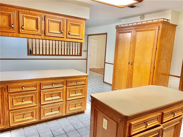 bathroom with vanity and tile patterned floors