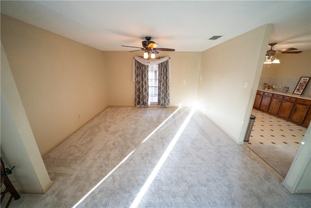 spare room featuring ceiling fan