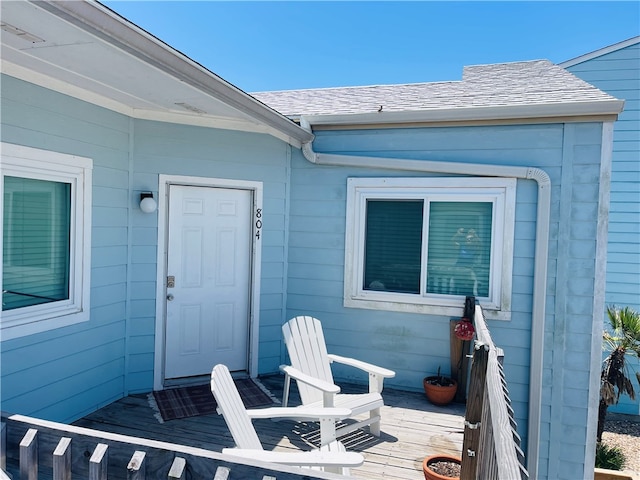 doorway to property with a wooden deck