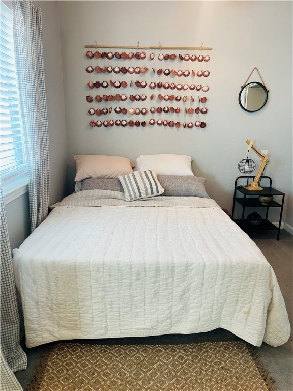 bedroom featuring carpet flooring