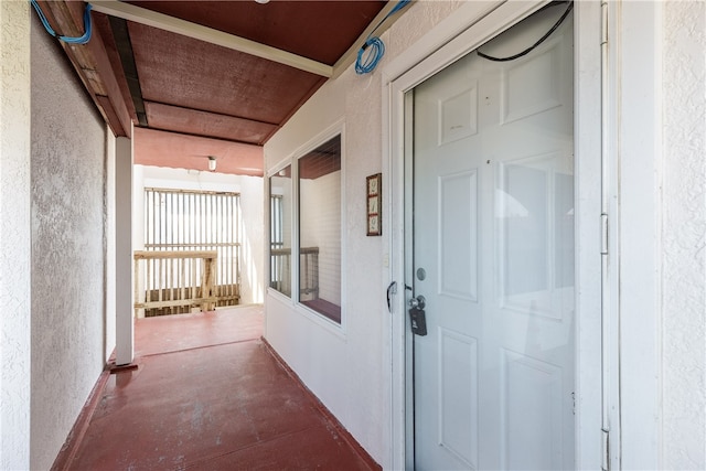 entrance to property with covered porch