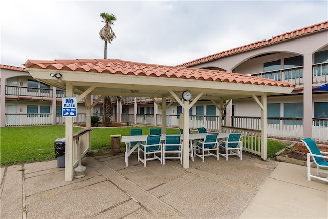 view of patio / terrace with a balcony