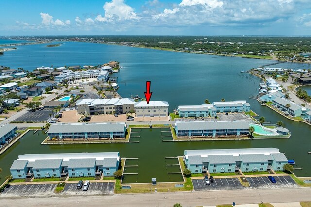 birds eye view of property featuring a water view