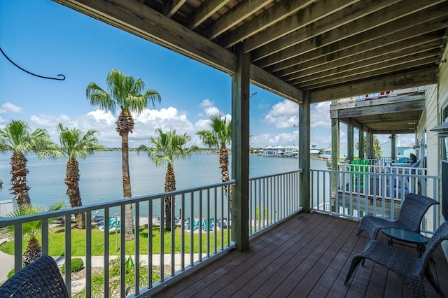 deck featuring a water view