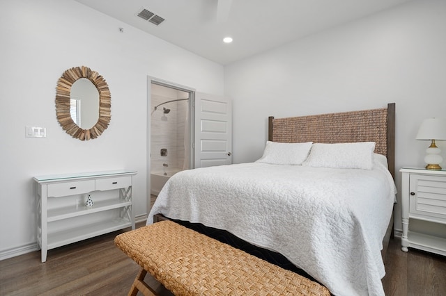 bedroom with ceiling fan and dark hardwood / wood-style floors