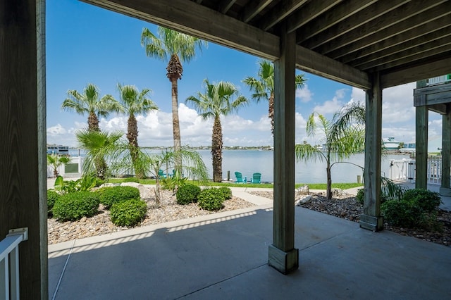 view of patio featuring a water view