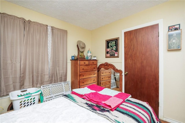 1037 Collingswood Dr, Corpus Christi, TX 78412 - bedroom with a textured ceiling