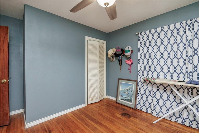 1037 Collingswood Dr, Corpus Christi, TX 78412 - unfurnished bedroom with wood finished floors, a closet, and ceiling fan