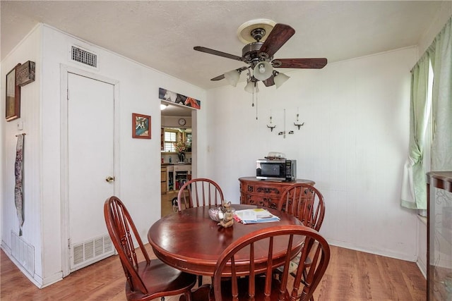 1037 Collingswood Dr, Corpus Christi, TX 78412 - dining space with light wood-style flooring and a ceiling fan