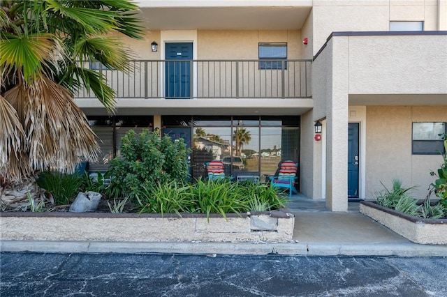 exterior space featuring a balcony