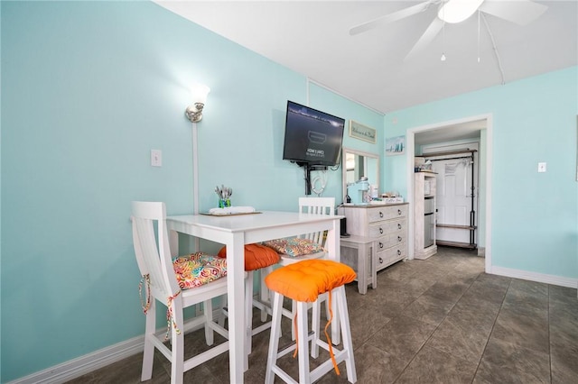 dining room featuring ceiling fan