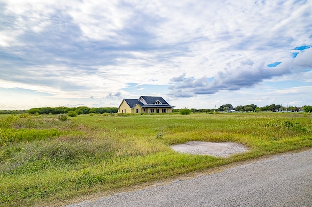 view of road with a rural view