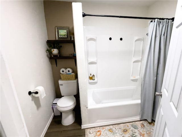 bathroom with toilet, hardwood / wood-style floors, and shower / bathtub combination with curtain