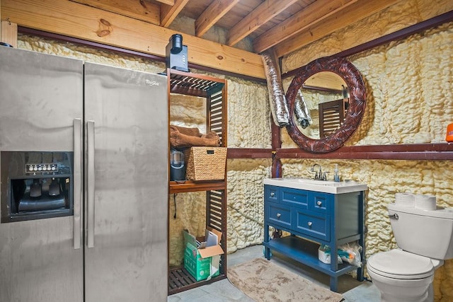 1400 Ross Ave, Port Aransas, TX 78373 - bathroom featuring vanity, toilet, and concrete flooring