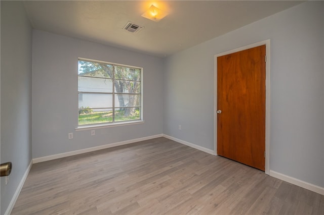 empty room featuring light wood-type flooring