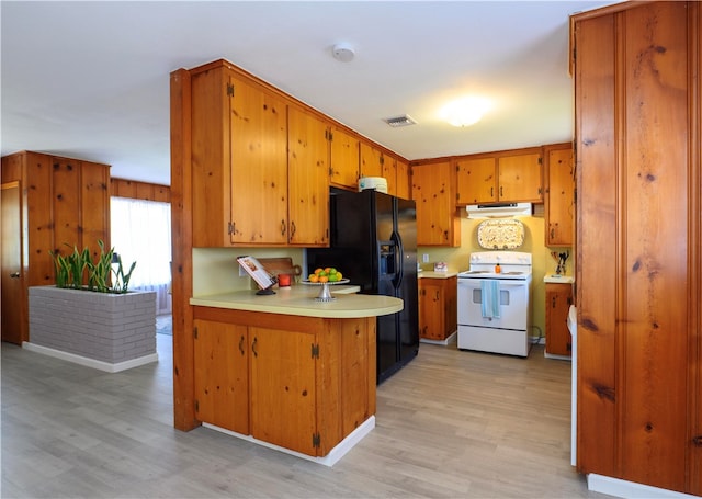 kitchen with light hardwood / wood-style flooring, kitchen peninsula, black fridge with ice dispenser, and electric range