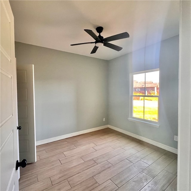 spare room featuring ceiling fan