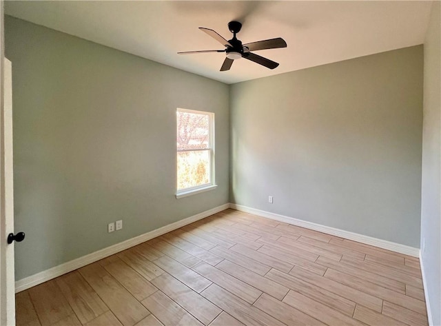 unfurnished room with ceiling fan and light wood-type flooring